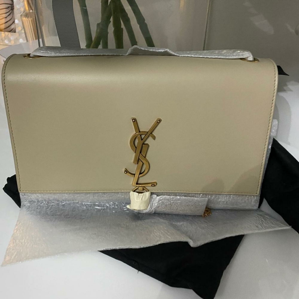 💥SOLD💥YSL rose gold tassle and chain.